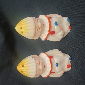 Harlequin Sad & Happy sitting clowns.